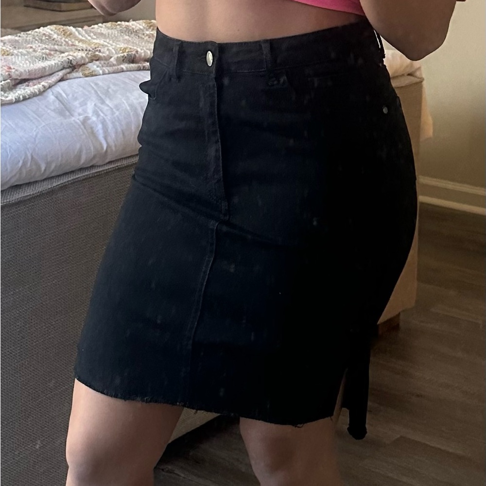NEVER WORN, TAGS STILL ON. Black jean midi skirt